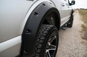 High-performance off-road tires on rugged pickup truck.